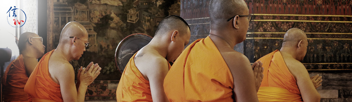 Buddhist monks chanting during a memorial service.